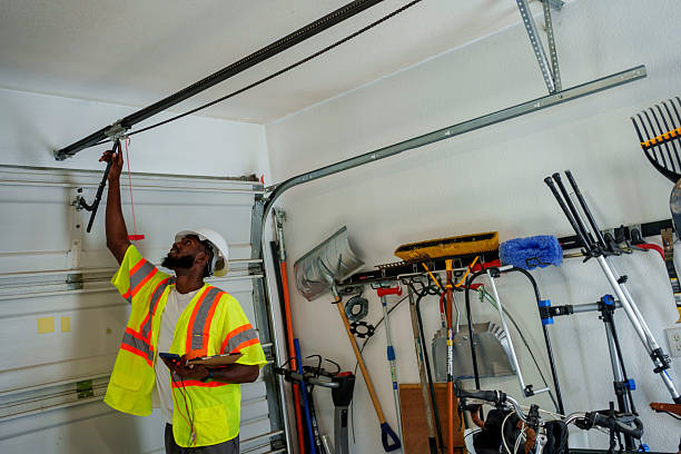 Professional Garage Door Panel Replacement technician working in Steilacoom, WA